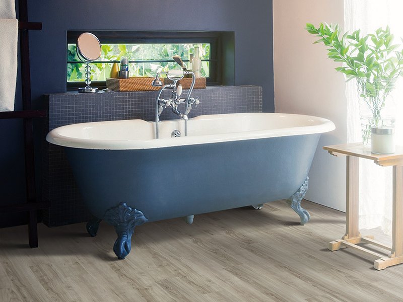 Modern bathroom with wood look flooring